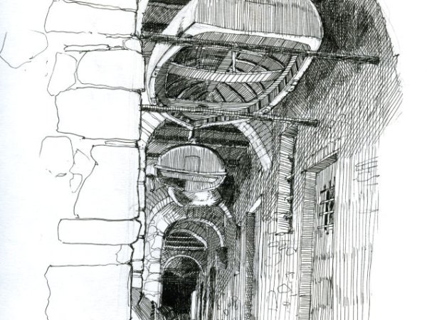 Covered Tellaro boat alleyway | Boats stored upside down in a fishing village in Liguria